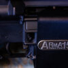 Close-up of the ARmA15 steel locking mount around an AR15 receiver, showing the ARmA15 badge.