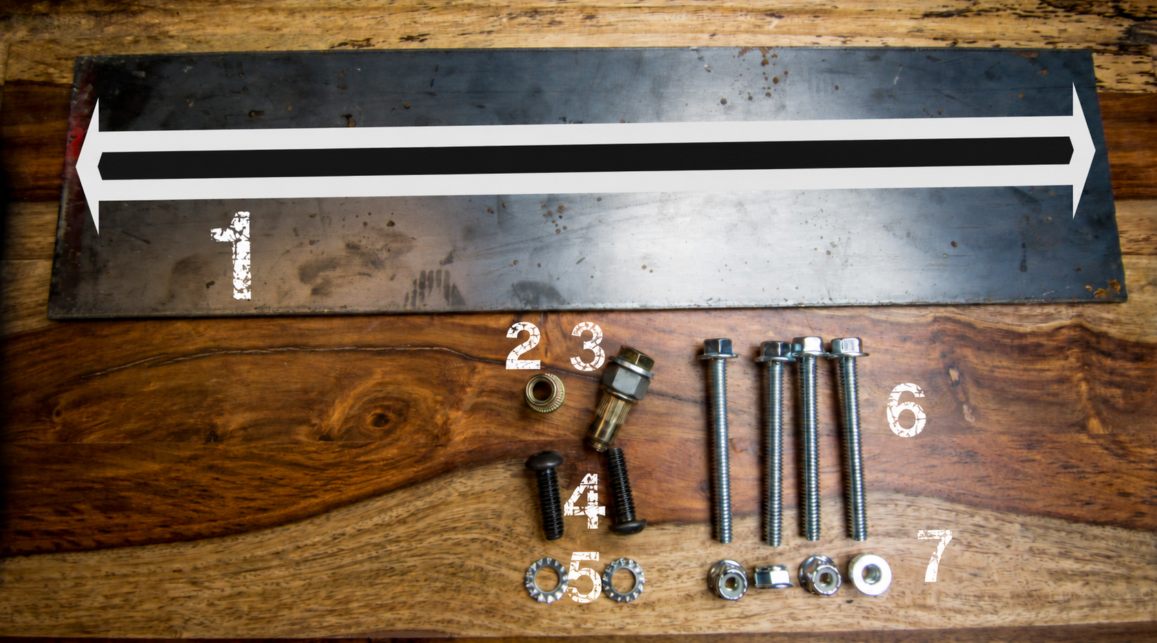 Dodge vehicle hardware — numbered parts 1–7 Dodge truck mounting hardware numbered 1–7: support bar, rivnut, installation tool, bolts, washers and nuts; wall hardware sold separately
